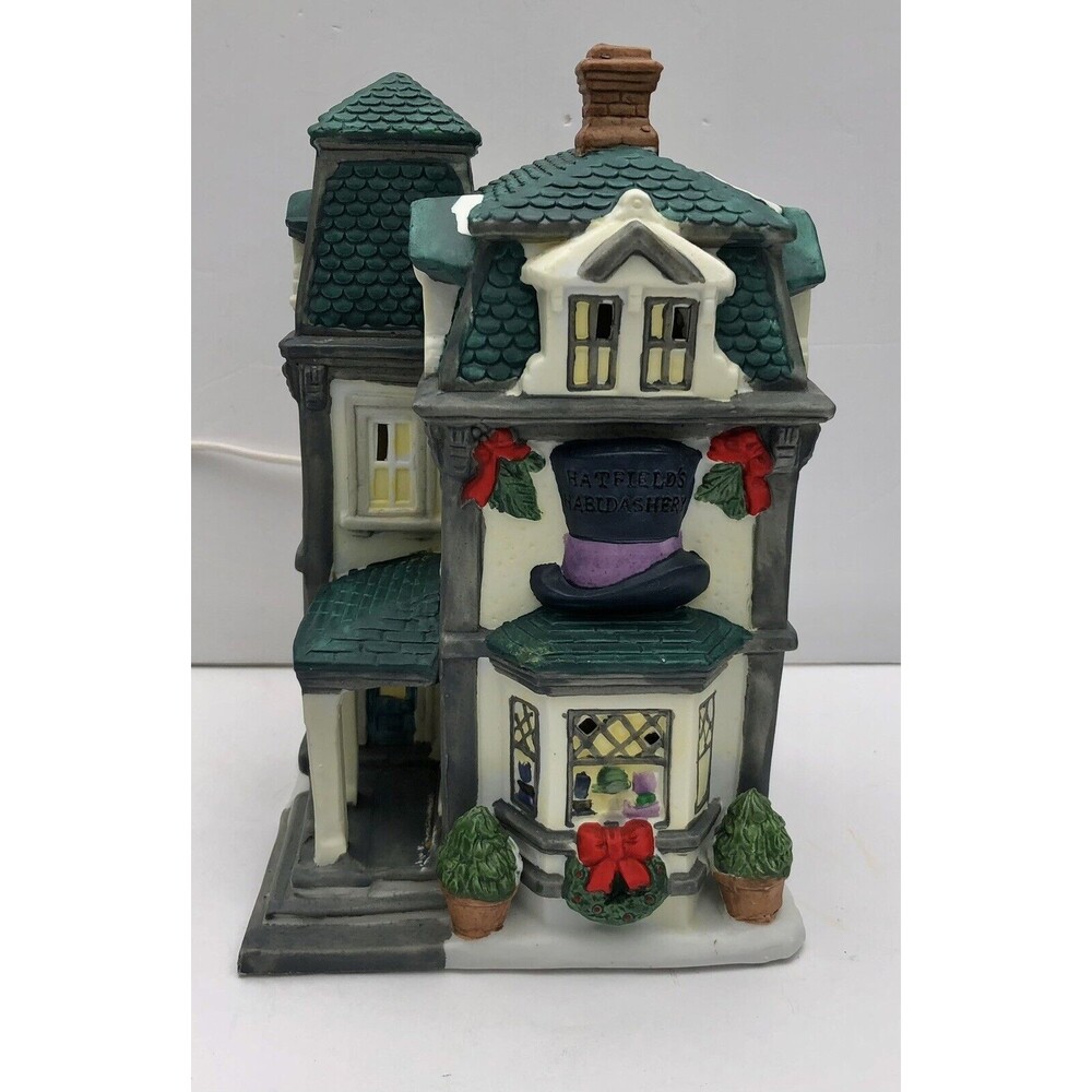 VILLAGE SQUARE COLLECTIBLES PORCLEAIN LIGHTED HOUSE "HATFIELDS HABERDASHERY"